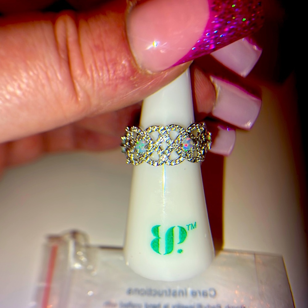 Lab grown pale green fire opal size 6 on rhodium pleading MSRP:$136